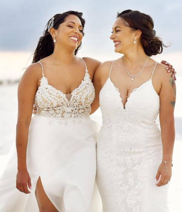 two brides getting married at the beach